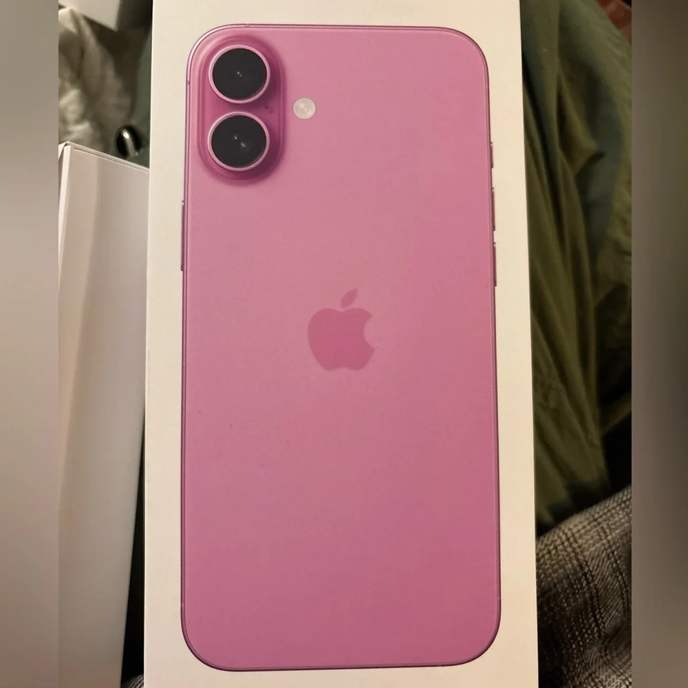 Two empty iPhone 16 plus boxes. Brand new. Colors are blue and pink.